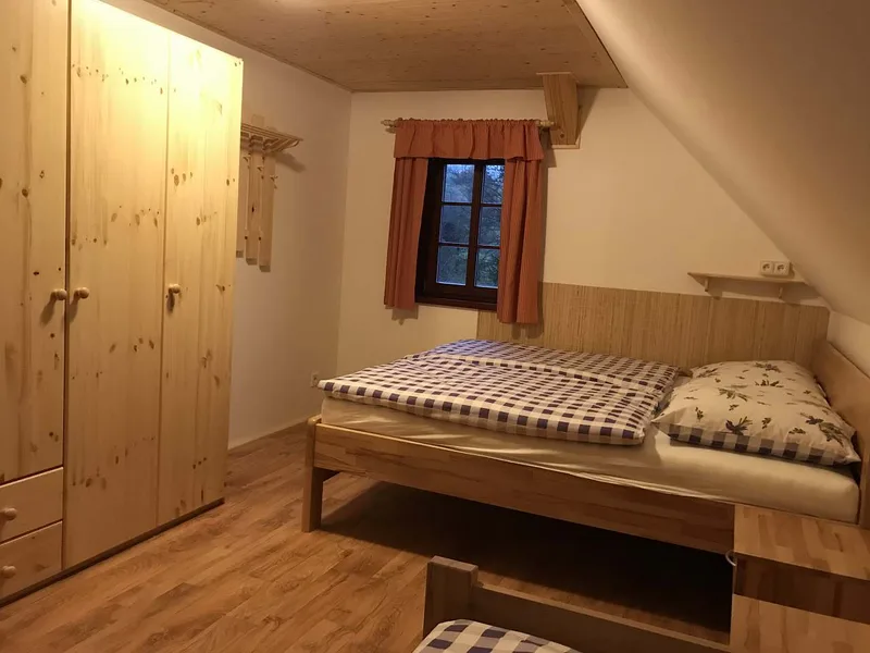Ložnice pod šikmou střechou